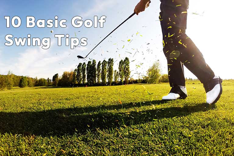 a man swinging a golf club on top of a lush green field learning 10 Basic Golf Swing Tips