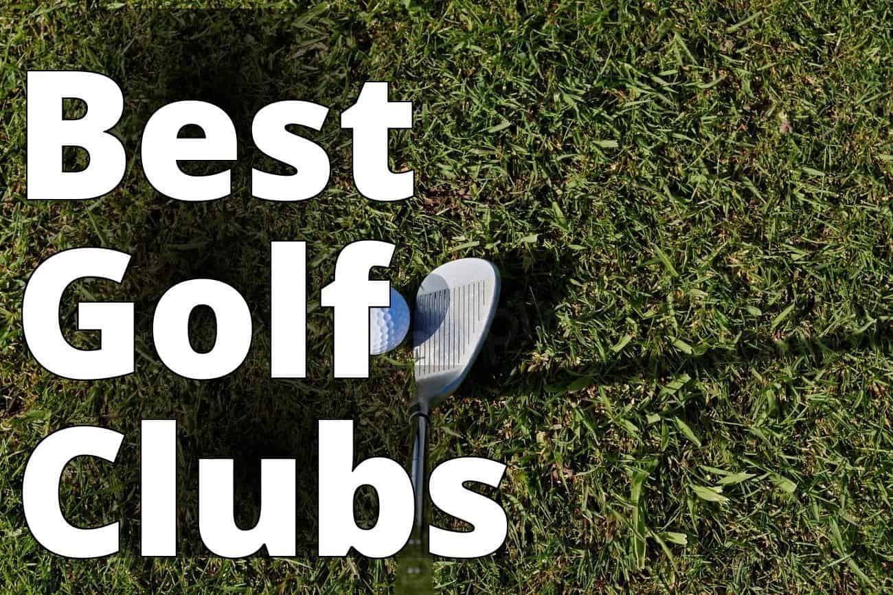 Closeup on golf club head - a golf ball and a golf club on the grass