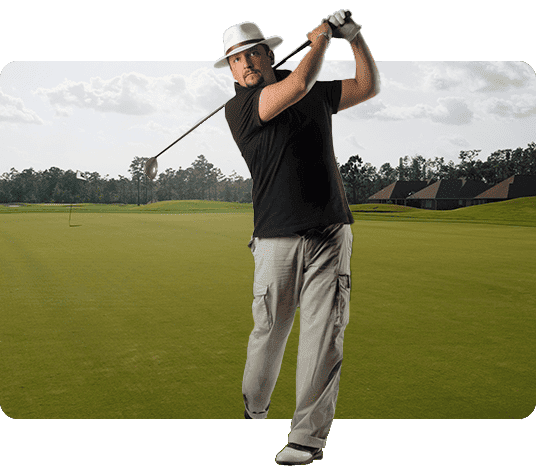 7 Helpful Hints to Drive Your Golf Ball Far 2 a man in black shirt and hat playing golf. Learn how to drive your golf ball far