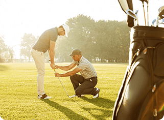#1 Golfing in Lake Charles: The Ultimate Guide to Our Scenic Course 2 two men are playing golf in the grass