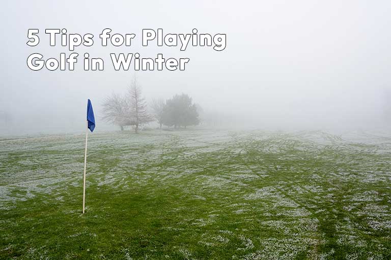 Foggy golf course with a blue flag, frost covering the grass, and text reading "5 Tips for Playing Golf in Winter.