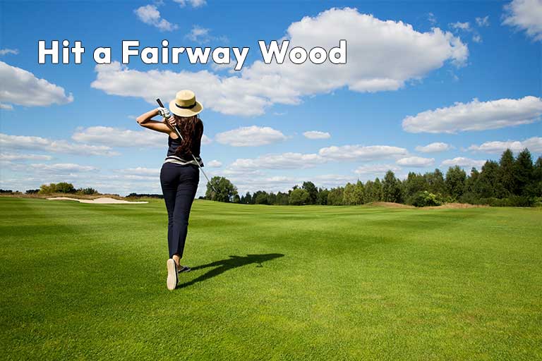A person wearing a hat walks on a golf course holding a golf club. The sky is clear with scattered clouds. Text reads: "Hit a Fairway Wood.