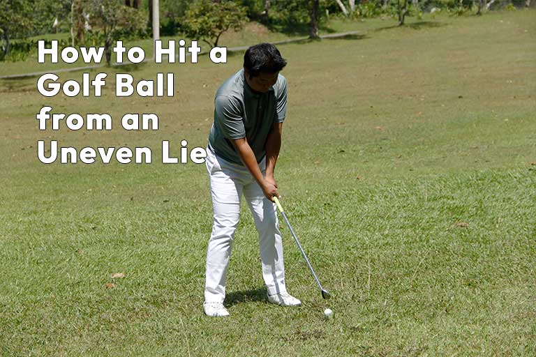 Man in a green shirt and dark pants about to strike a golf ball on a grassy field with a caption about hitting from an uneven lie.