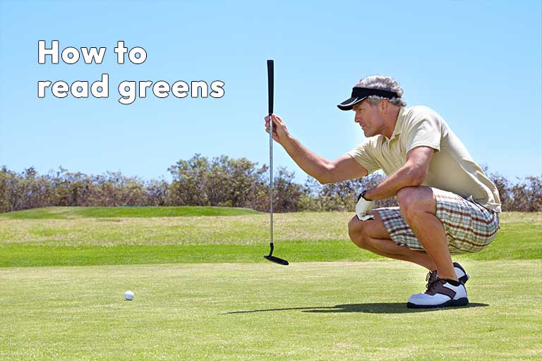 A man squatting on a golf course, eyeing the terrain near a golf ball, with a putter in hand and text overlay "how to read greens".